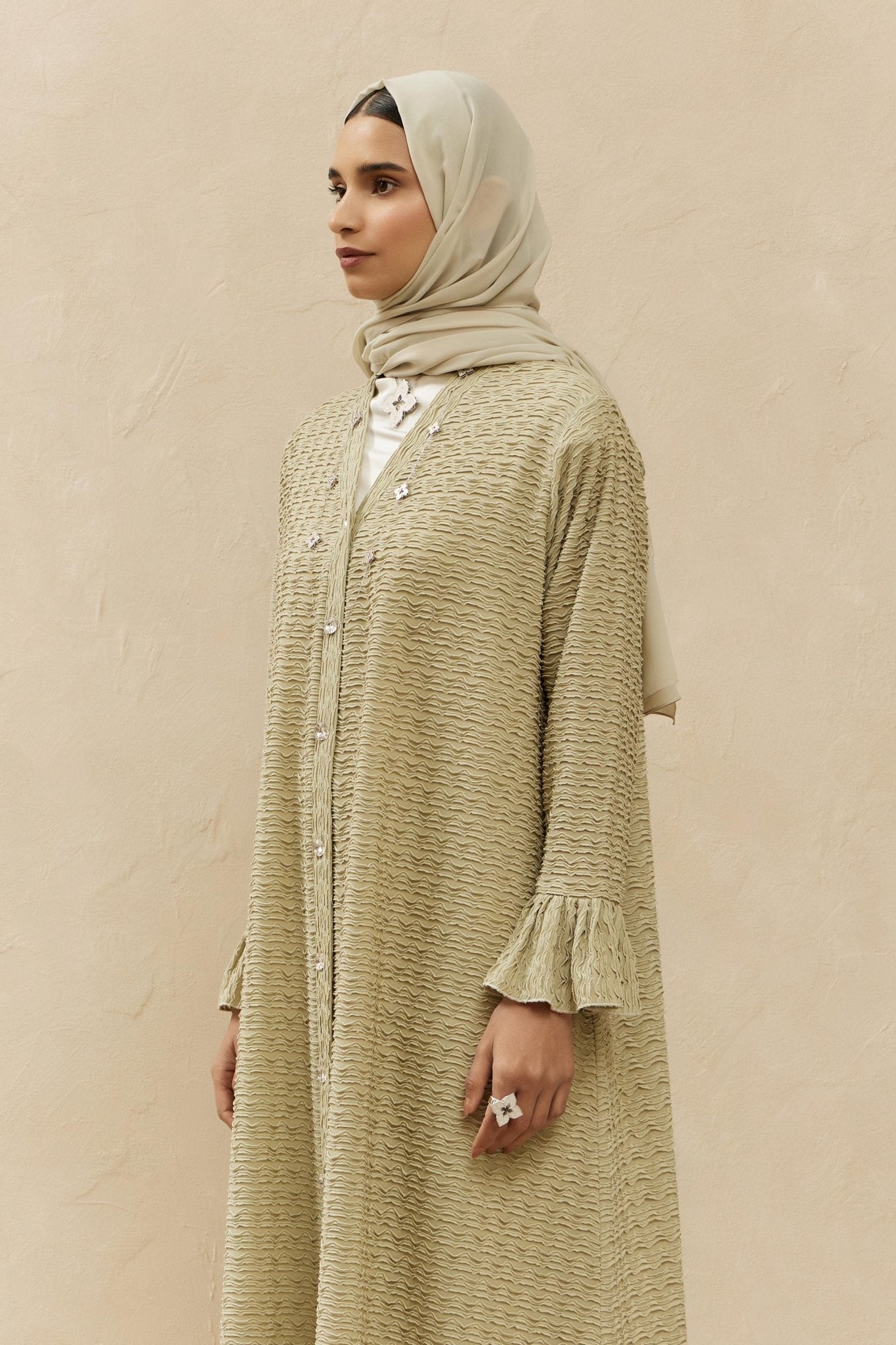 ASW - 455 ABAYA - AL ASWAD - MIRA Y MANO