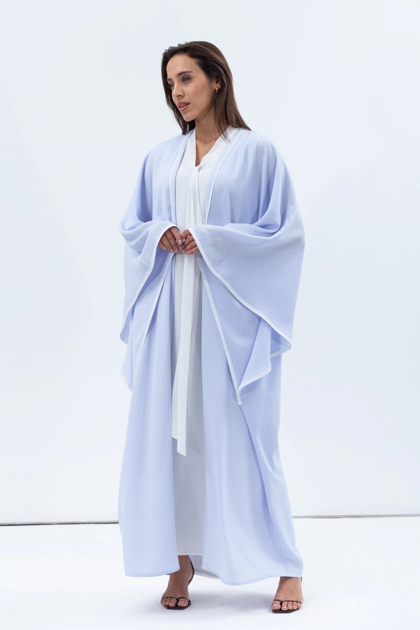 AB - FL - LBL - WP ABAYA - CHIKA - MIRA Y MANO