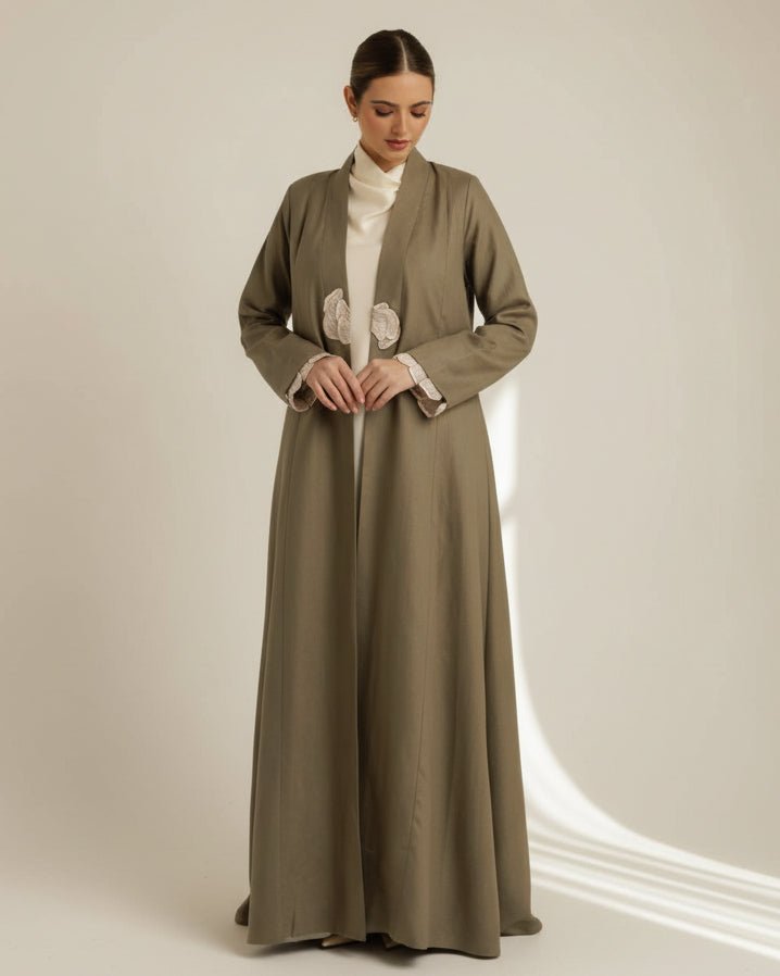 G244-GRN ABAYA - GUL - MIRA Y MANO