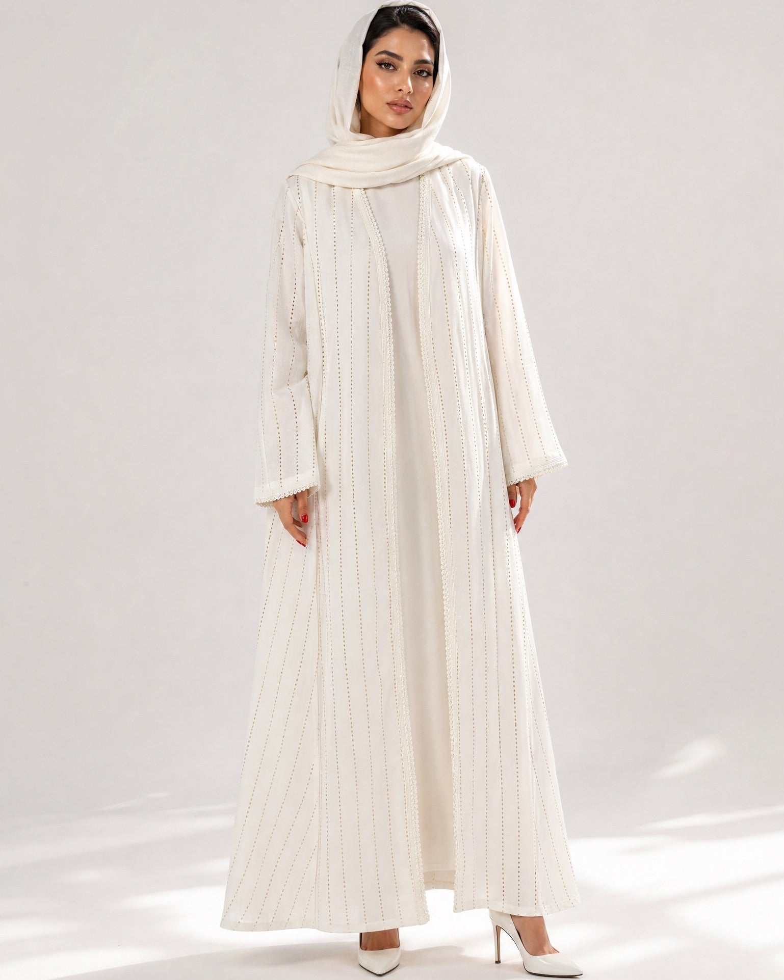 SCYCLE-57 ABAYA - SCYCLE - MIRA Y MANO