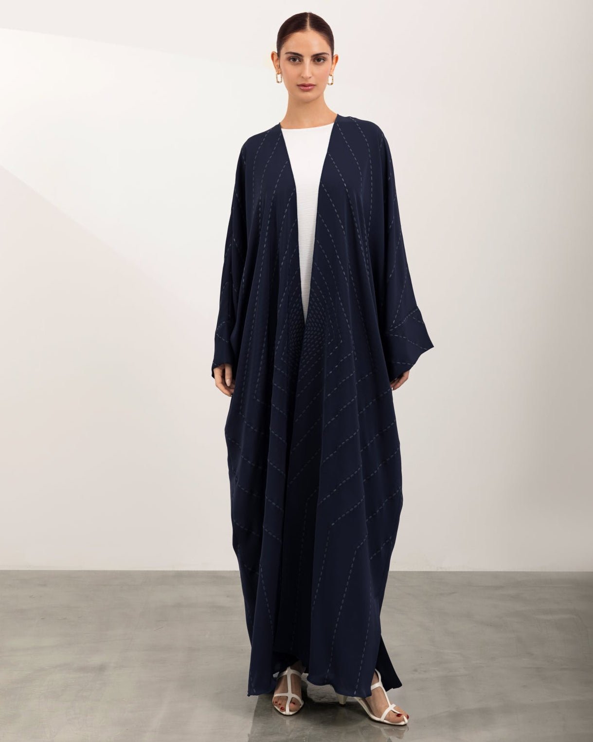 A26-08 ABAYA - ASL - MIRA Y MANO
