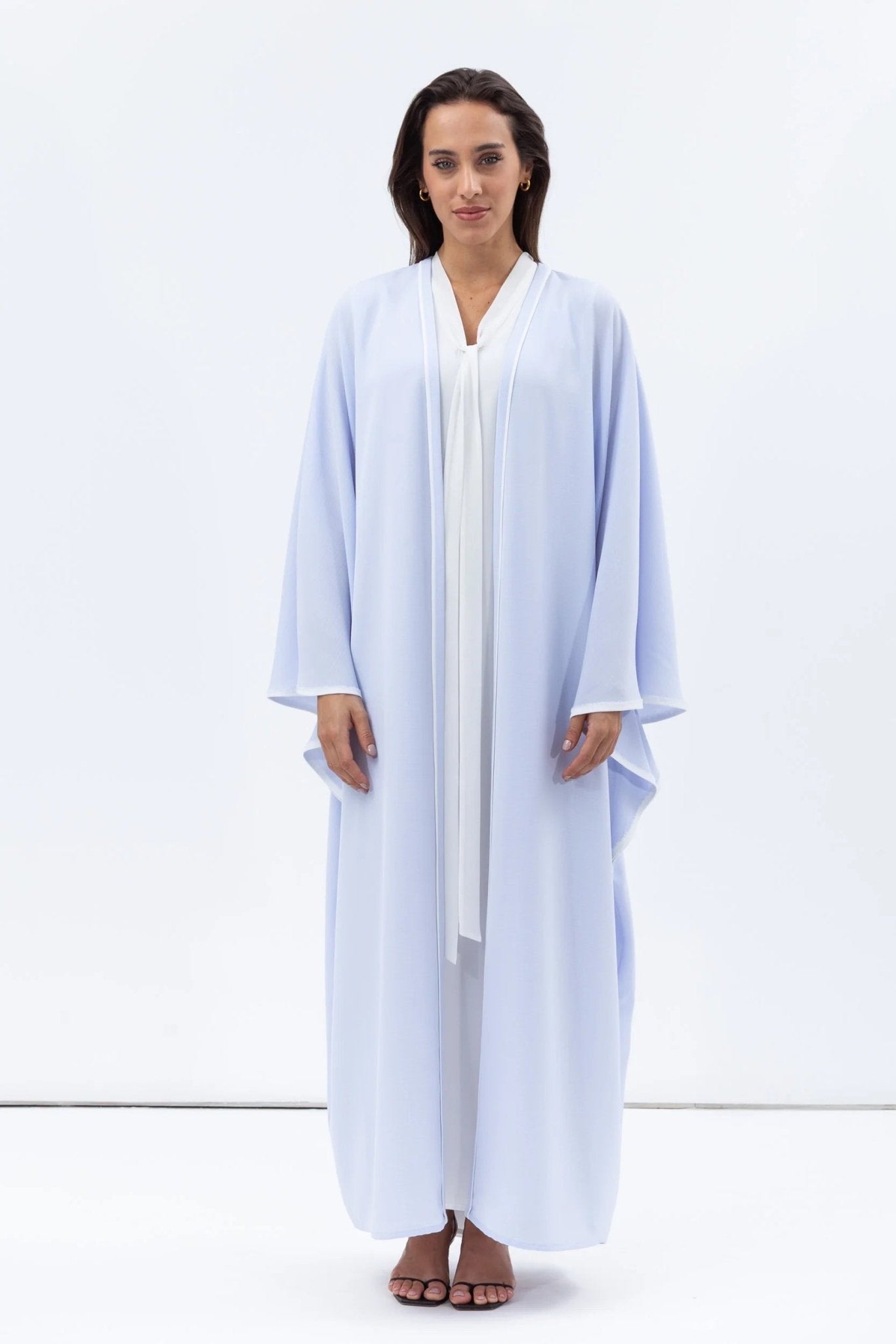 AB - FL - LBL - WP ABAYA - CHIKA - MIRA Y MANO