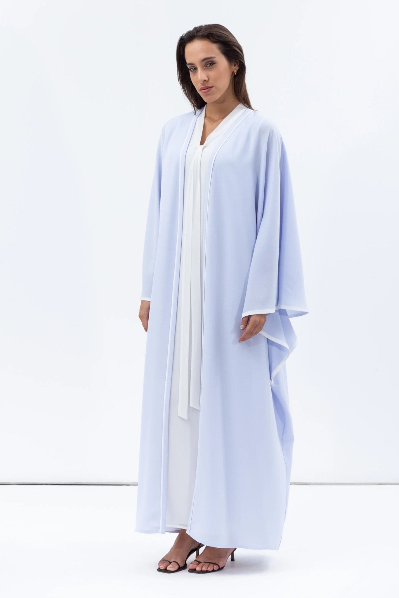 AB - FL - LBL - WP ABAYA - CHIKA - MIRA Y MANO
