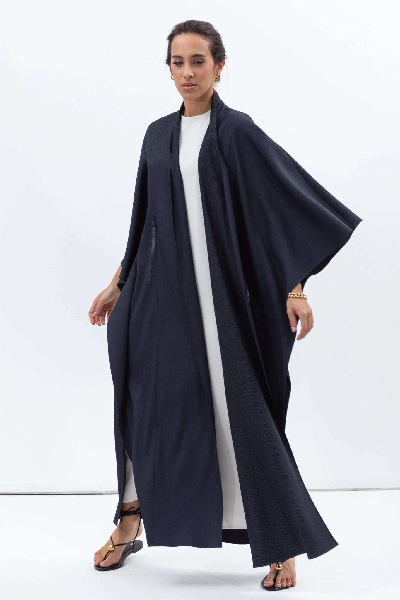 AB - FL - TXT - TBLU ABAYA - CHIKA - MIRA Y MANO