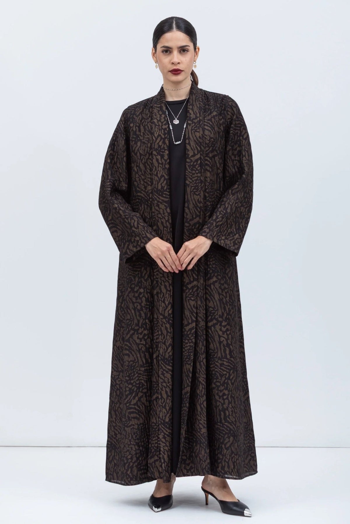 AB-SL-BLK-GPP ABAYA - CHIKA - MIRA Y MANO
