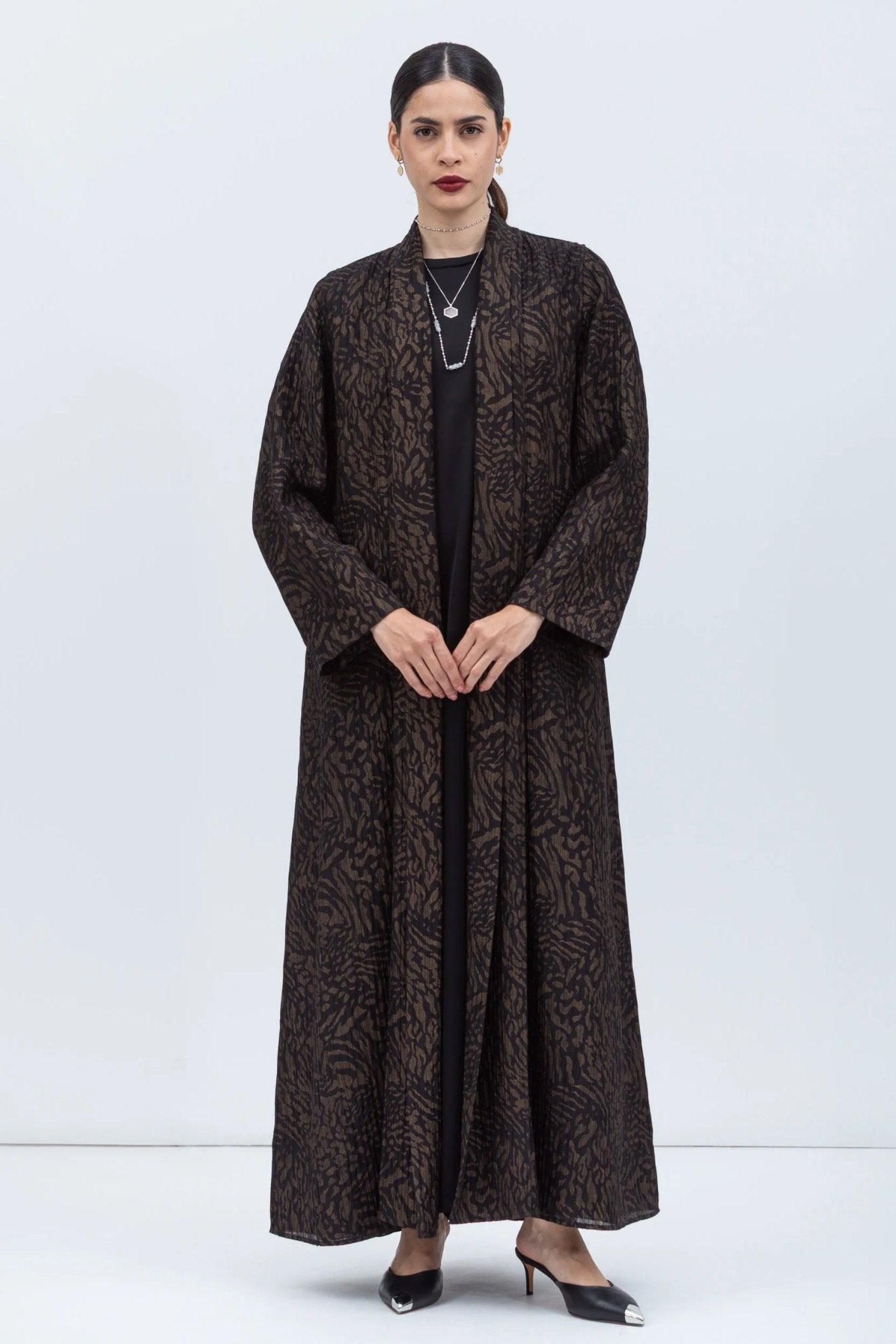 AB-SL-BLK-GPP ABAYA - CHIKA - MIRA Y MANO