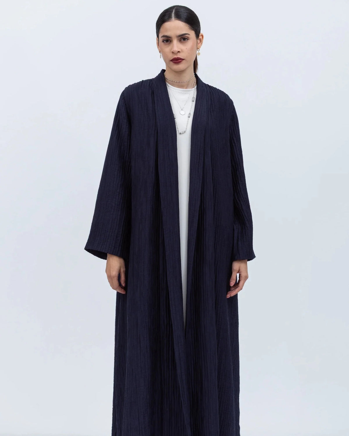 AB-SL-NVY ABAYA - CHIKA - MIRA Y MANO