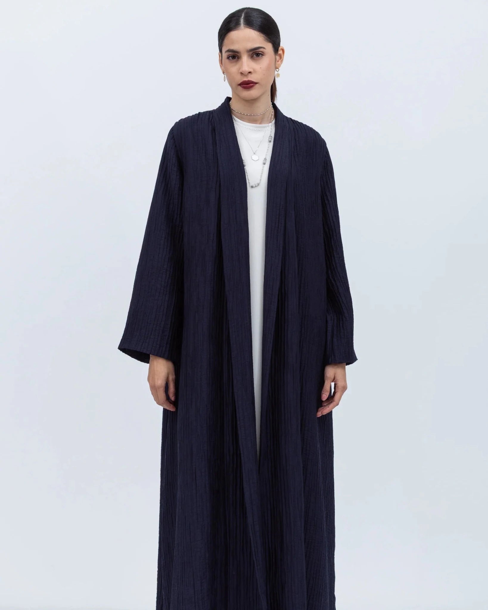 AB-SL-NVY ABAYA - CHIKA - MIRA Y MANO