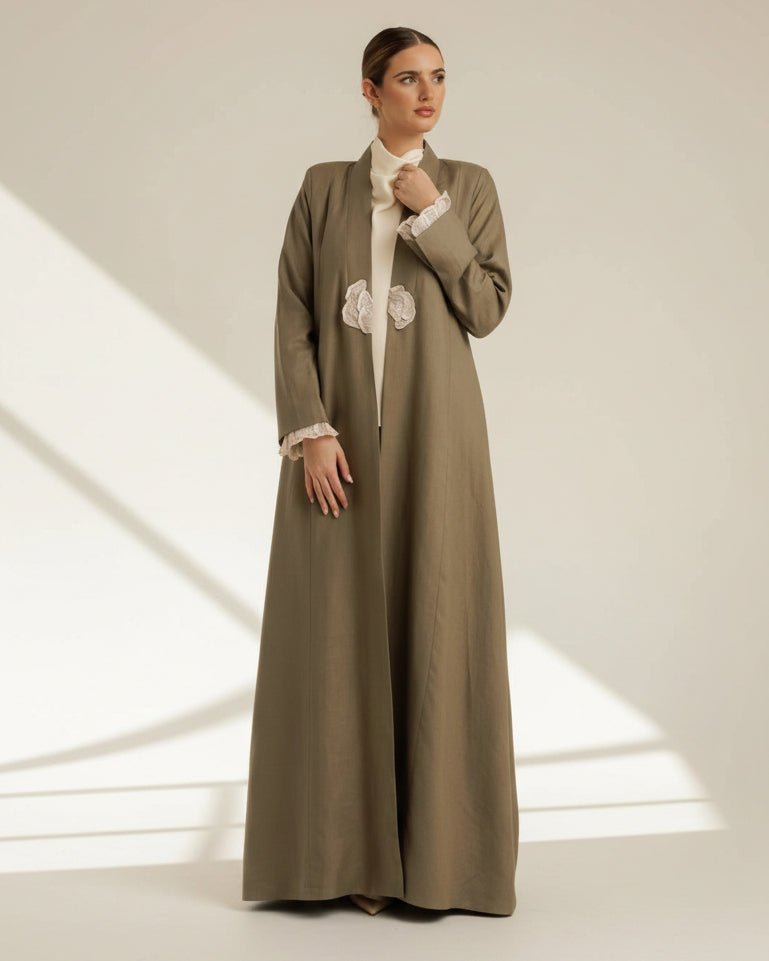 G244-GRN ABAYA - GUL - MIRA Y MANO