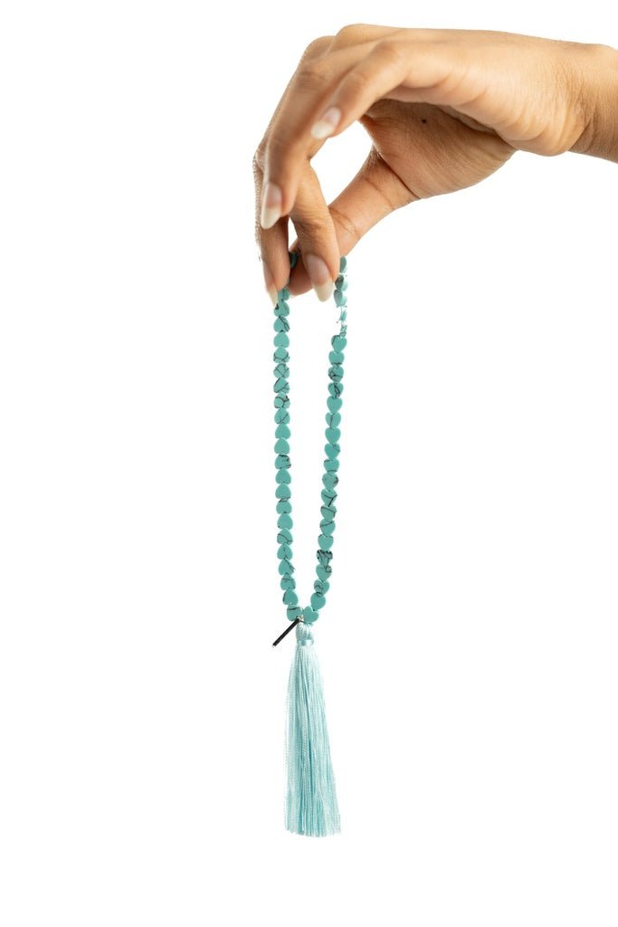 TC - 02 TASSEL CHARM - KHAM - MIRA Y MANO