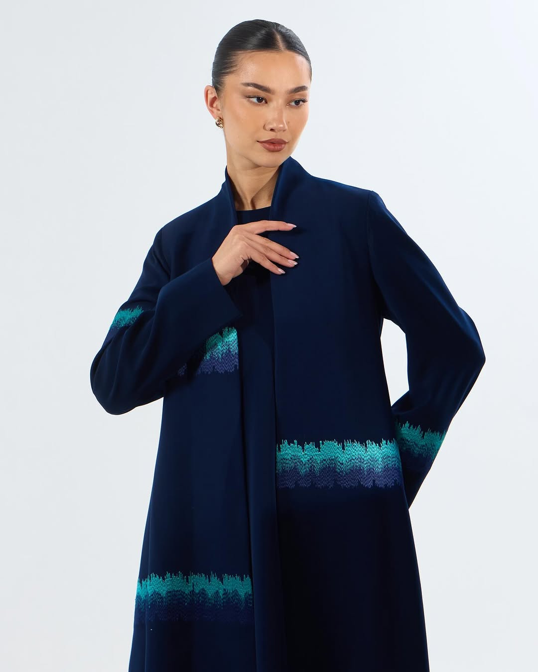 LE05E - NY ABAYA - LEGACY - MIRA Y MANO