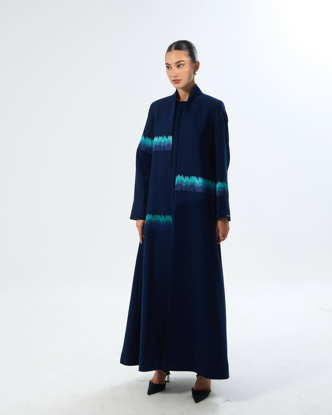 LE05E - NY ABAYA - LEGACY - MIRA Y MANO