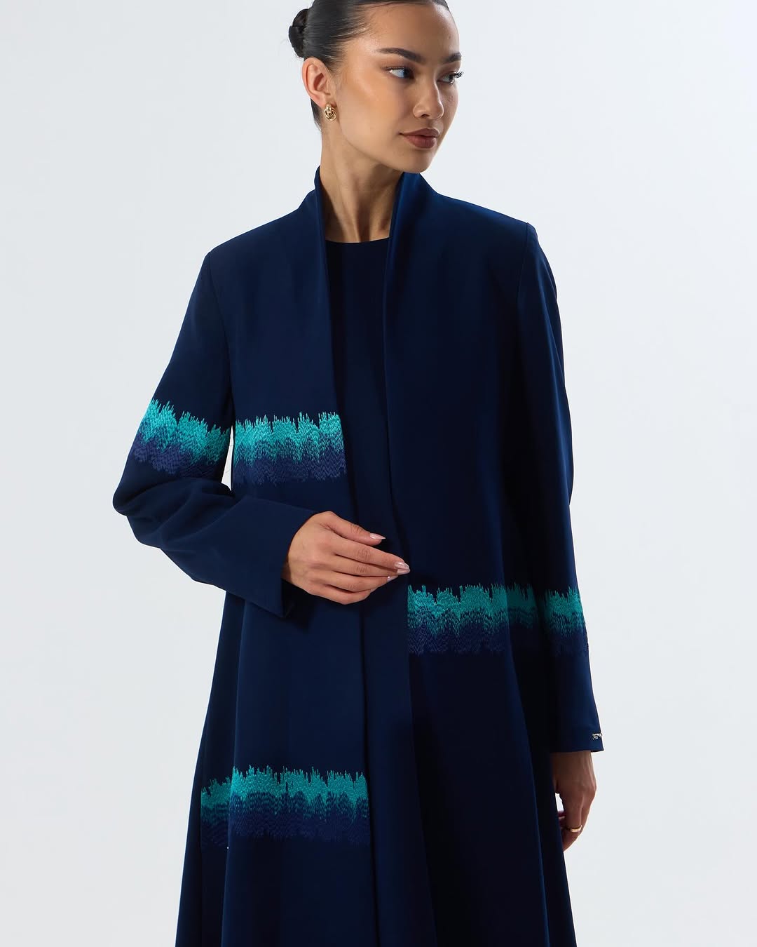 LE05E - NY ABAYA - LEGACY - MIRA Y MANO