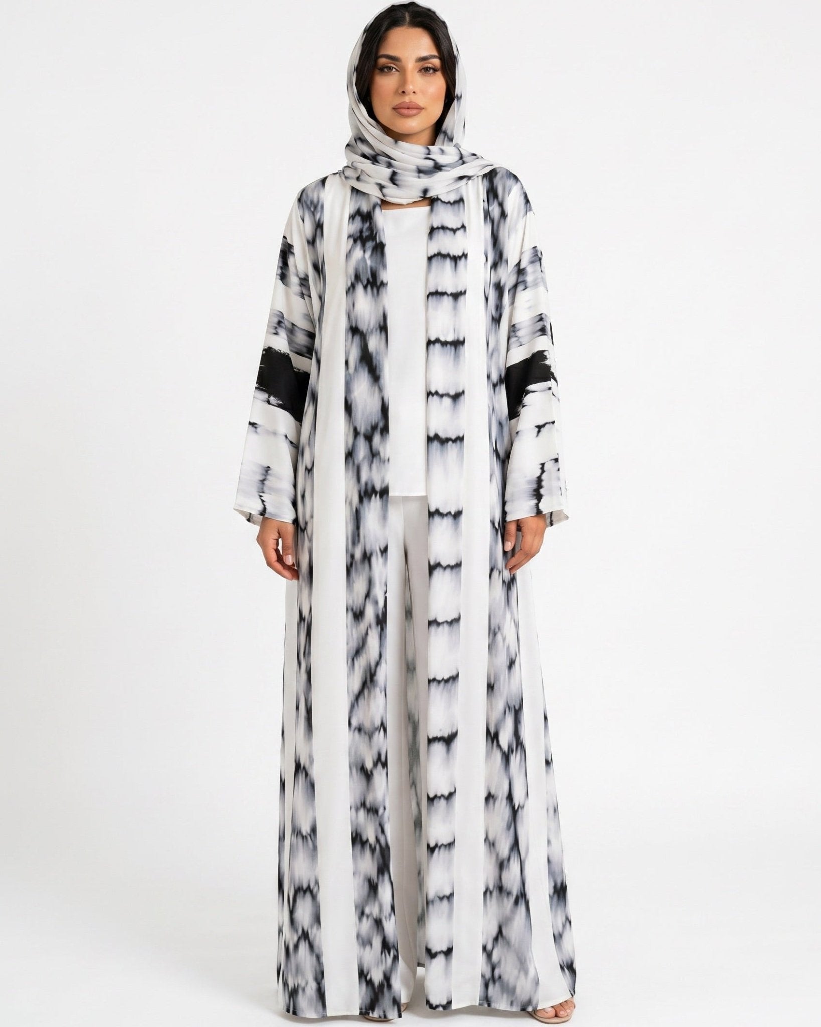 ATHAR - WH ABAYA - LOVAH - MIRA Y MANO