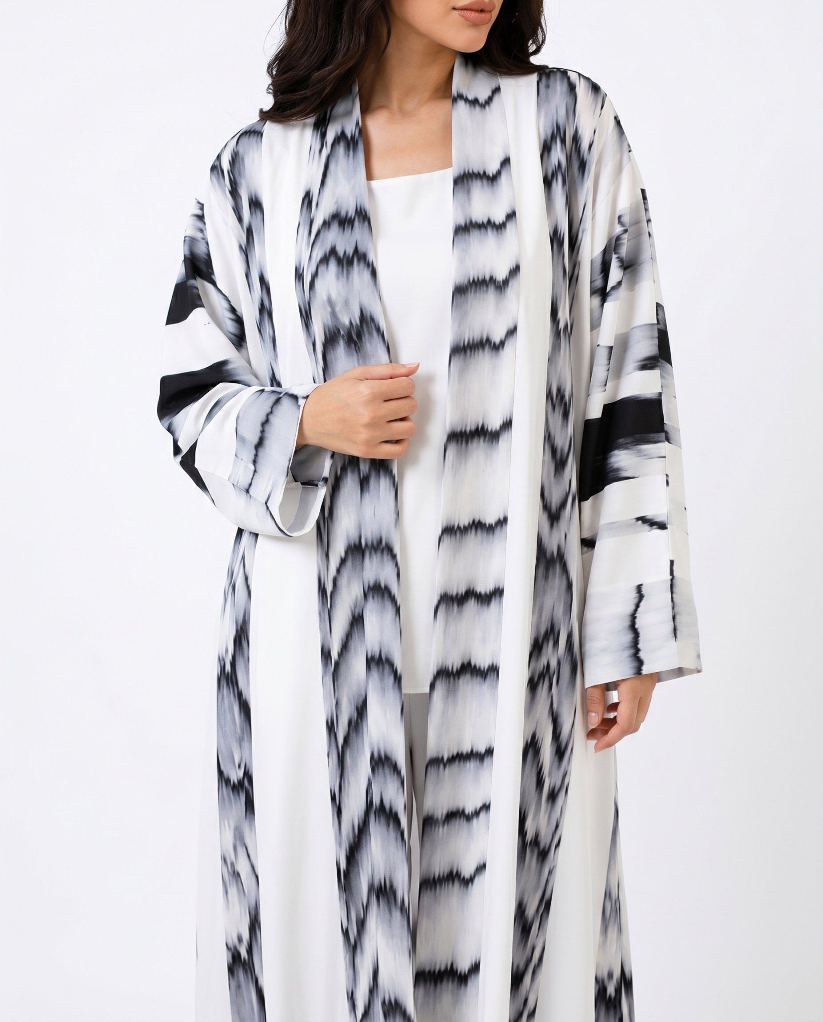 ATHAR - WH ABAYA - LOVAH - MIRA Y MANO