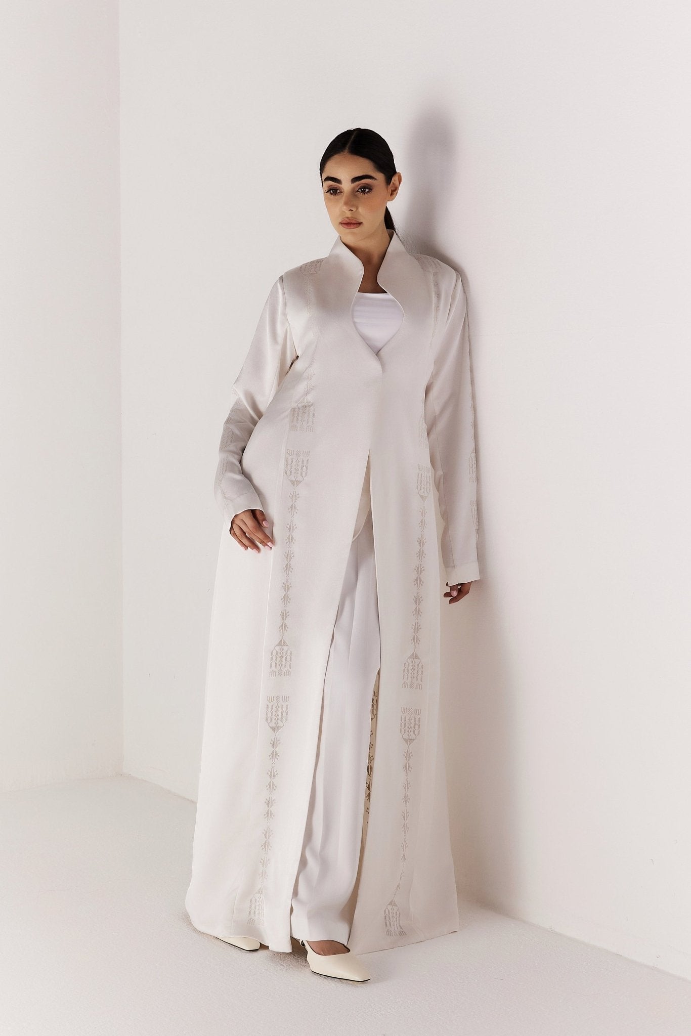 BELL - WH ABAYA - MEDD - MIRA Y MANO