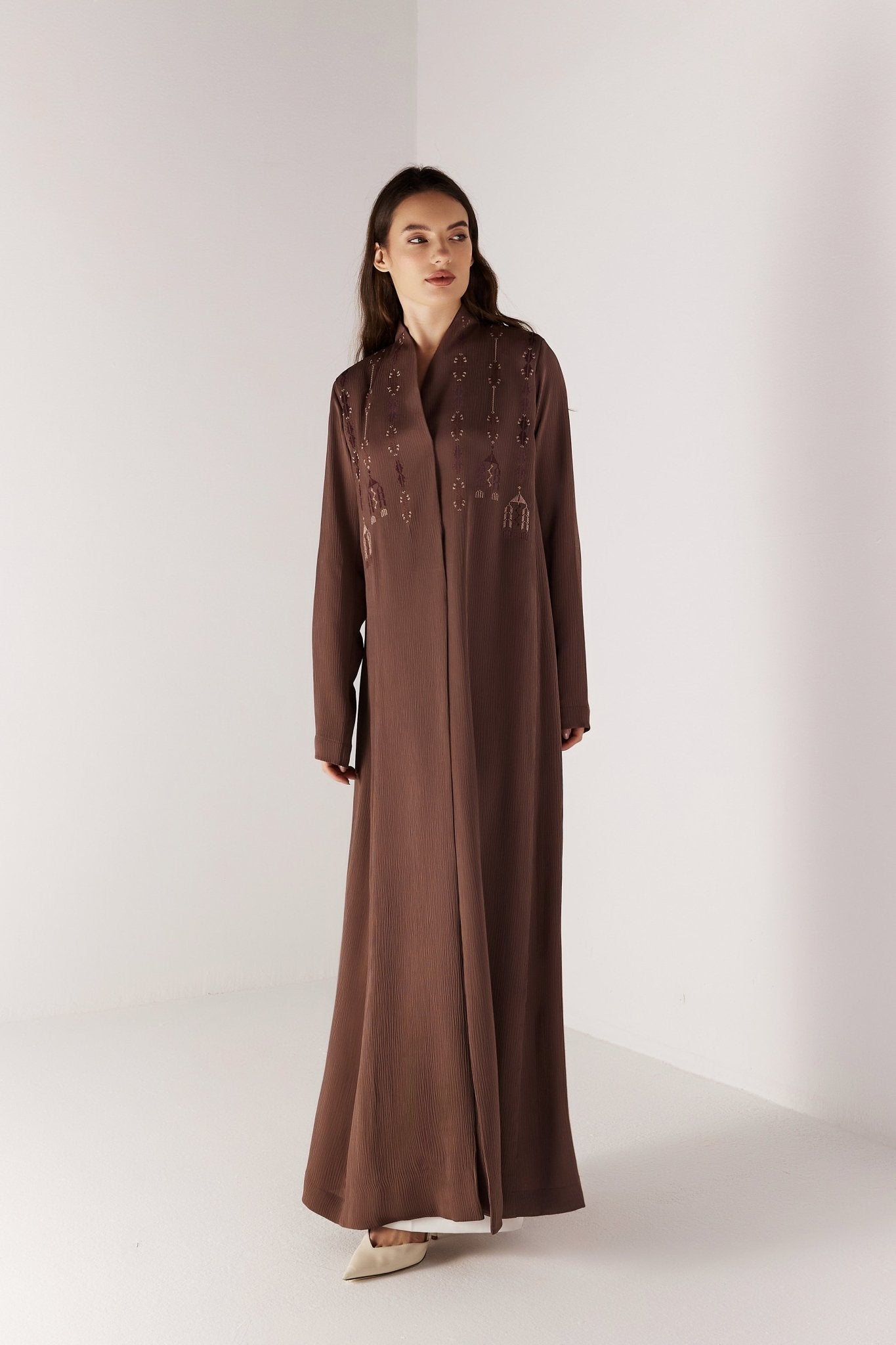 NILI - BR ABAYA - MEDD - MIRA Y MANO