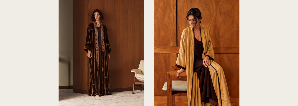 Two autumn looks in wood-panelled rooms: a brown velvet abaya with an embroidered lapel, and a goldenrod washed-silk abaya over a dark brown dress