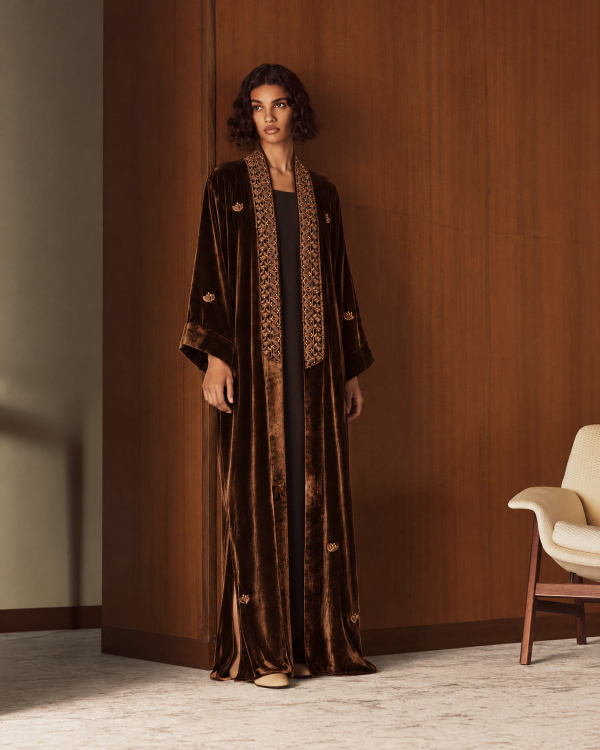 Three autumn looks: a dark brown jacquard abaya, a brown velvet abaya with a beaded lapel, and a black velvet abaya with lace trim