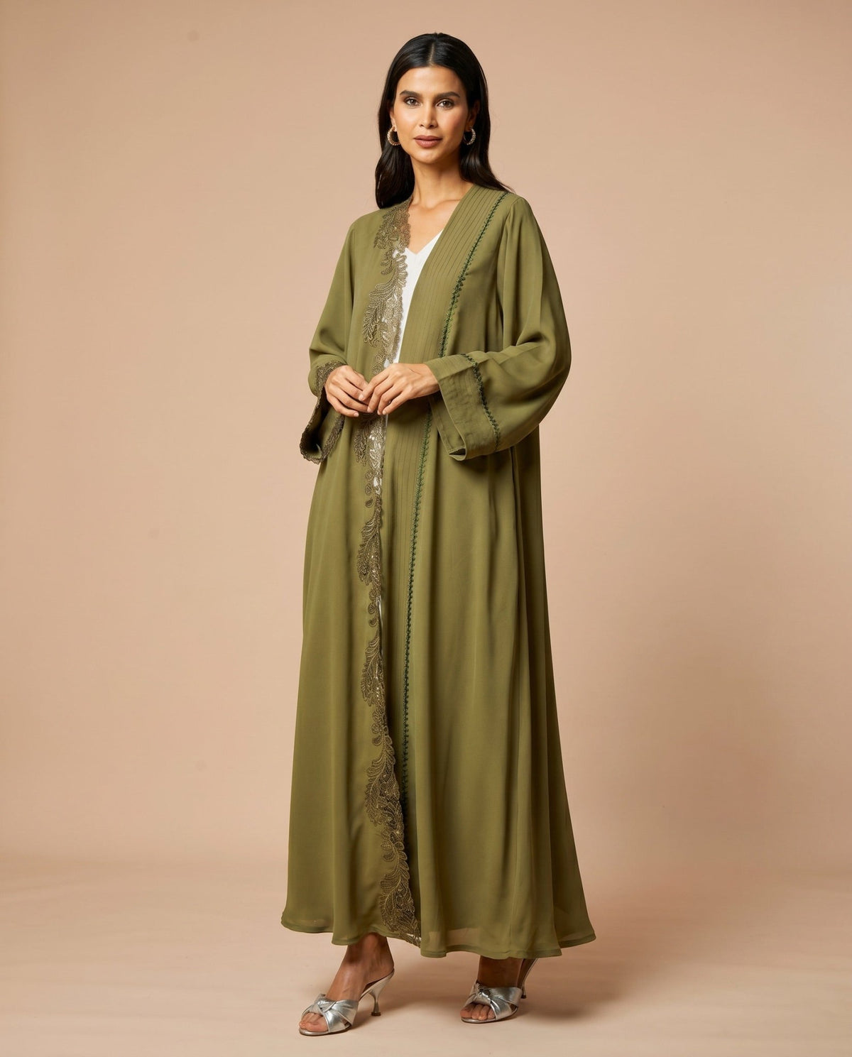 NM-416 ABAYA - MIRA Y MANO
