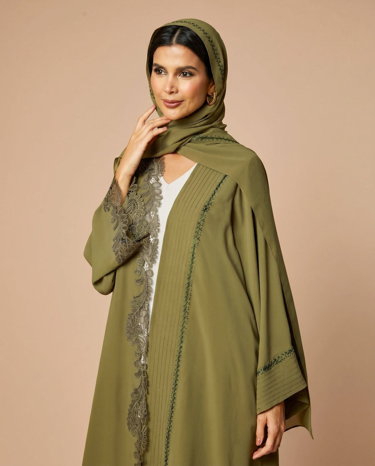 NM-416 ABAYA - MIRA Y MANO