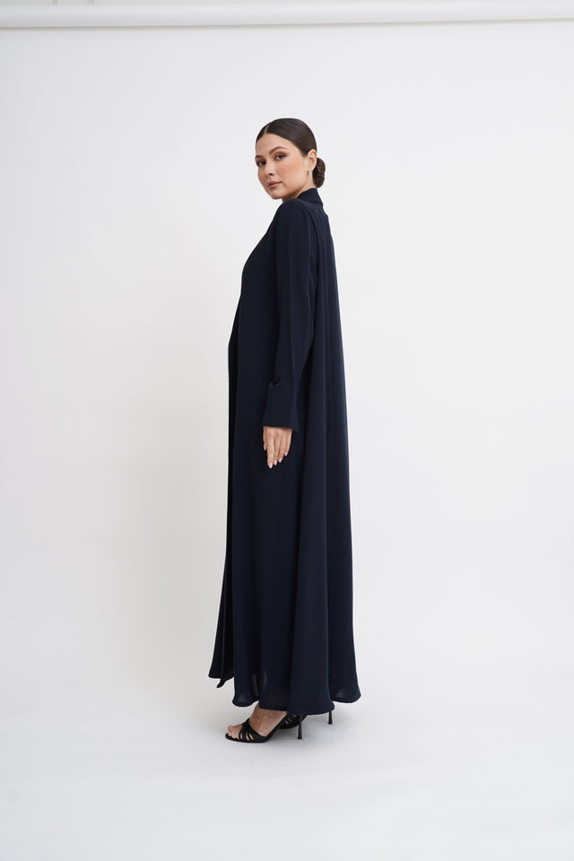 ST - 243 - NY ABAYA - NOWAYER - MIRA Y MANO