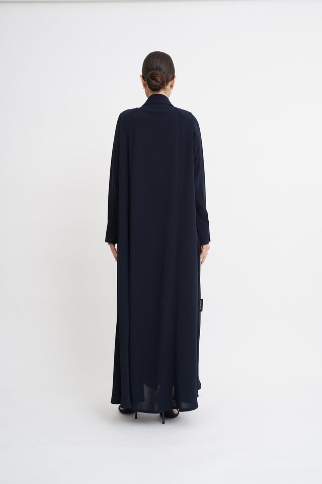 ST - 243 - NY ABAYA - NOWAYER - MIRA Y MANO