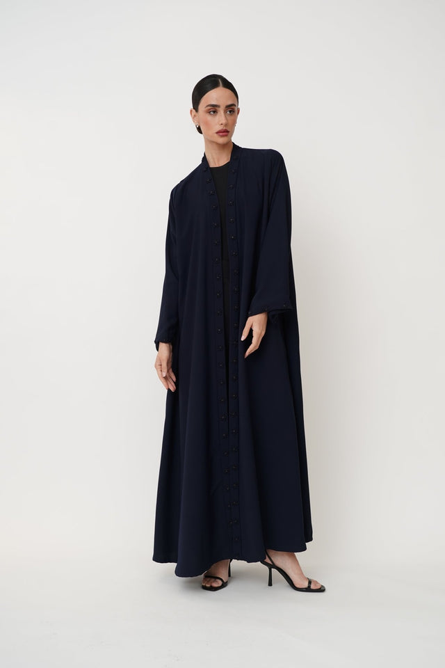 ST - 2453 - NY ABAYA - NOWAYER - MIRA Y MANO