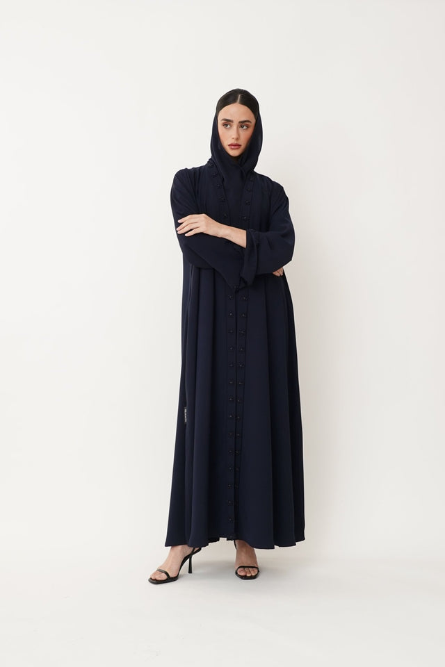 ST - 2453 - NY ABAYA - NOWAYER - MIRA Y MANO