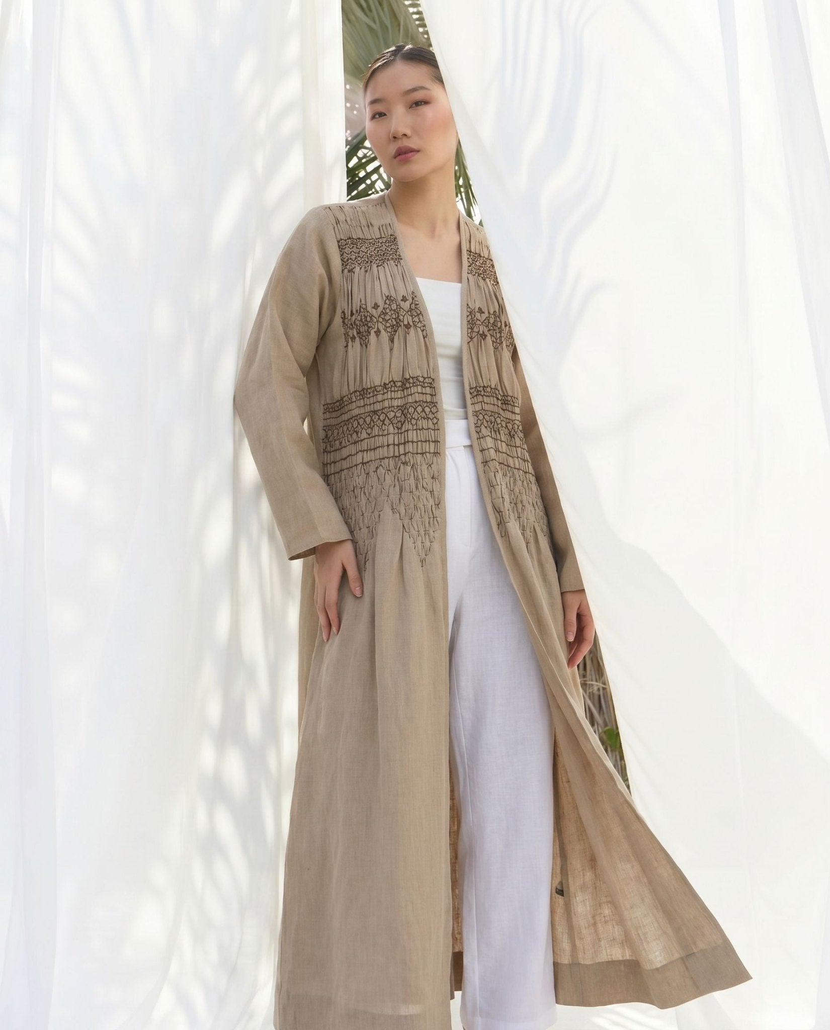 SMOCKED IN BEIGE ABAYA - PRIVILEGE OFFICIAL - MIRA Y MANO
