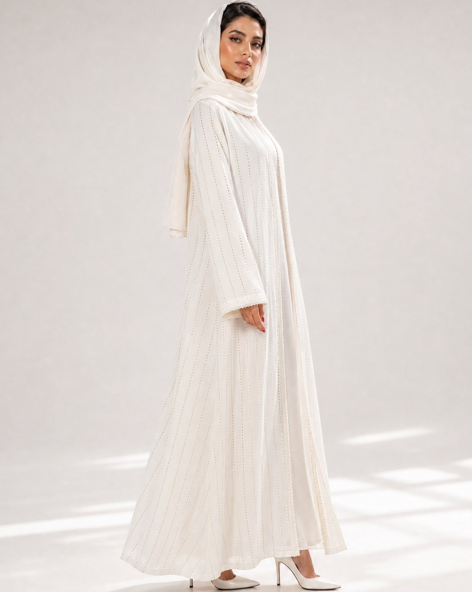 SCYCLE-57 ABAYA - SCYCLE - MIRA Y MANO