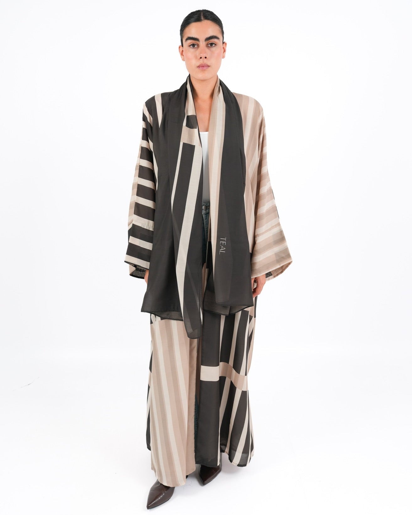 STRATA-BG ABAYA - TEAL - MIRA Y MANO