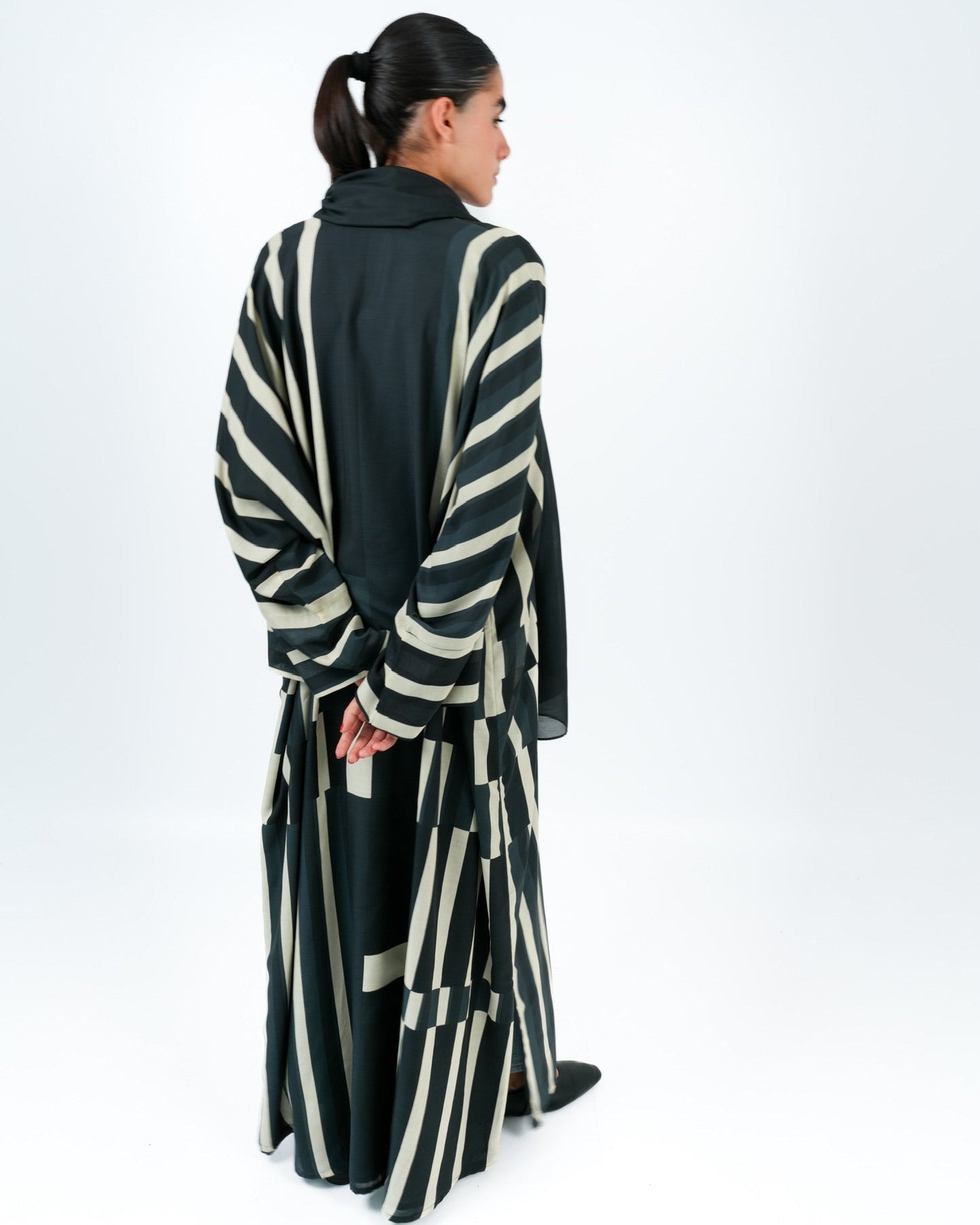 STRATA-BK ABAYA - TEAL - MIRA Y MANO