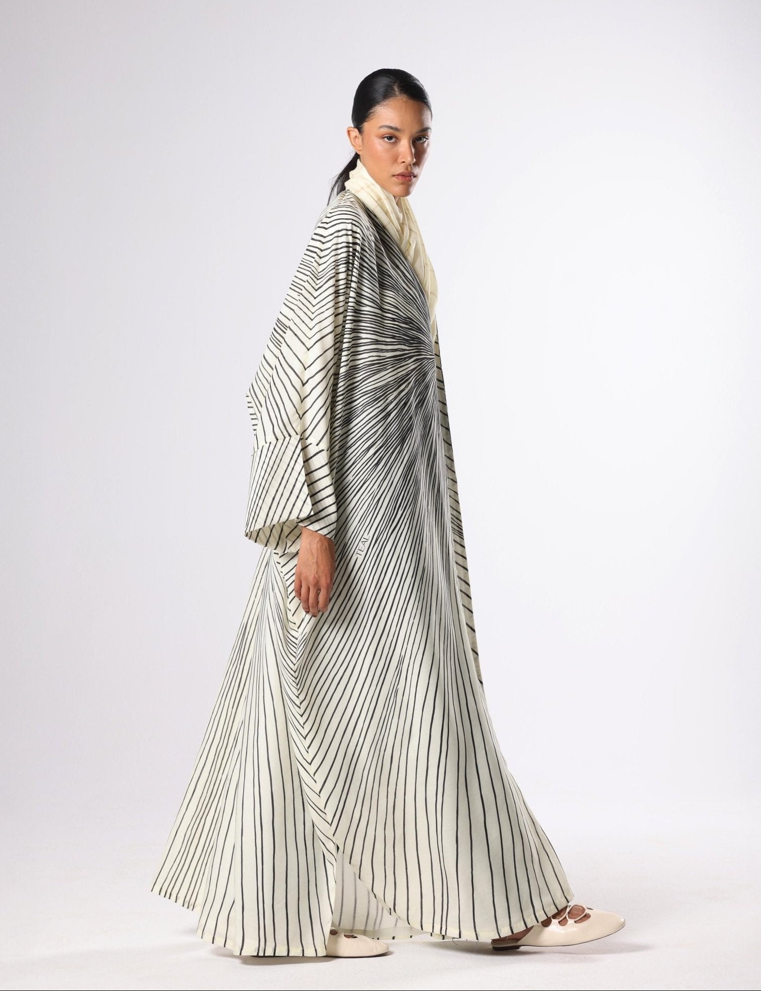 SUNRAYS - W ABAYA - TEAL - MIRA Y MANO