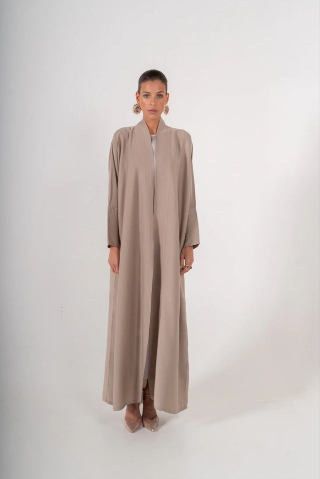 TH1383 ABAYA - THAA KSA - MIRA Y MANO