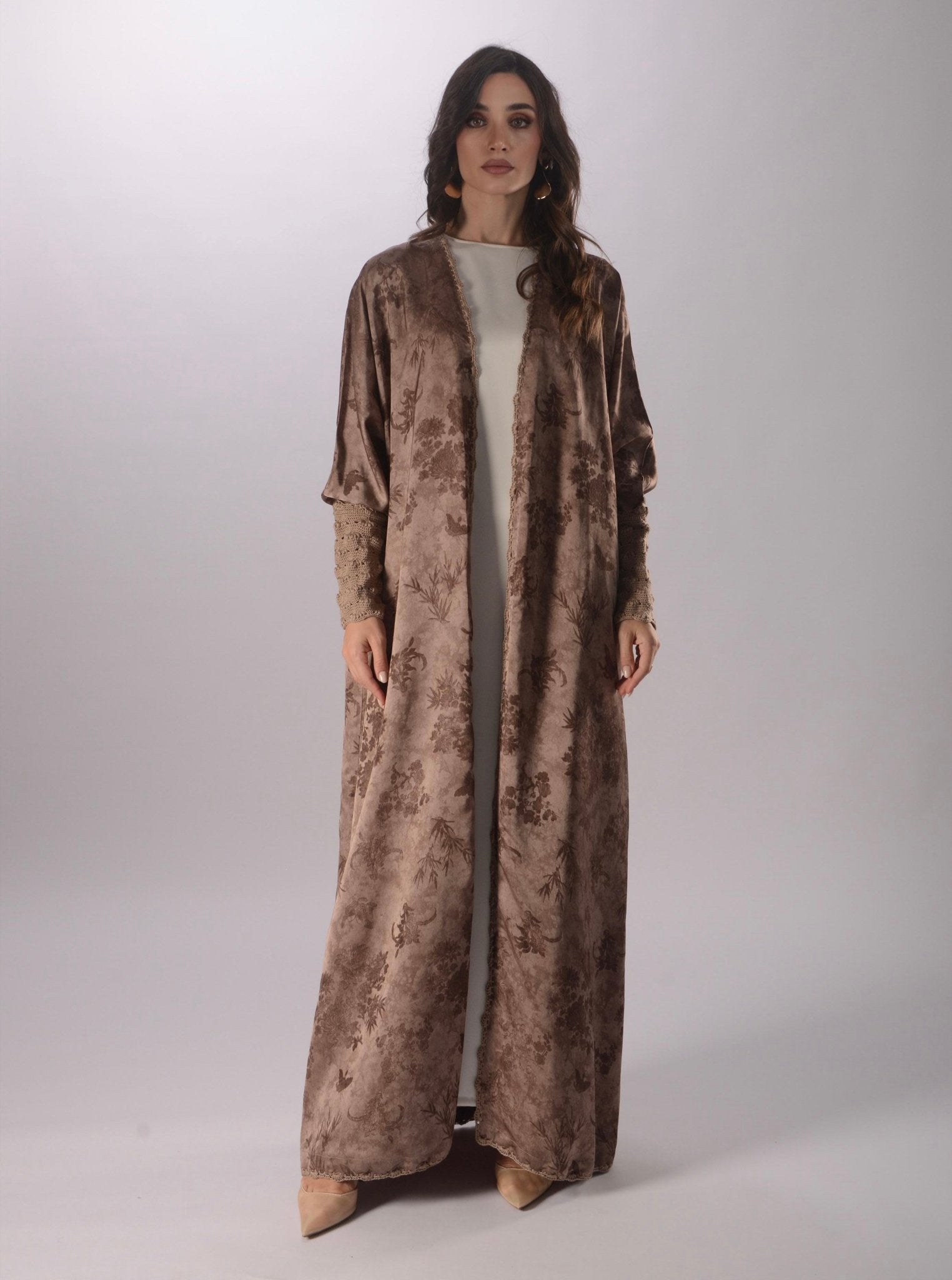 TH1722 ABAYA - THAA KSA - MIRA Y MANO