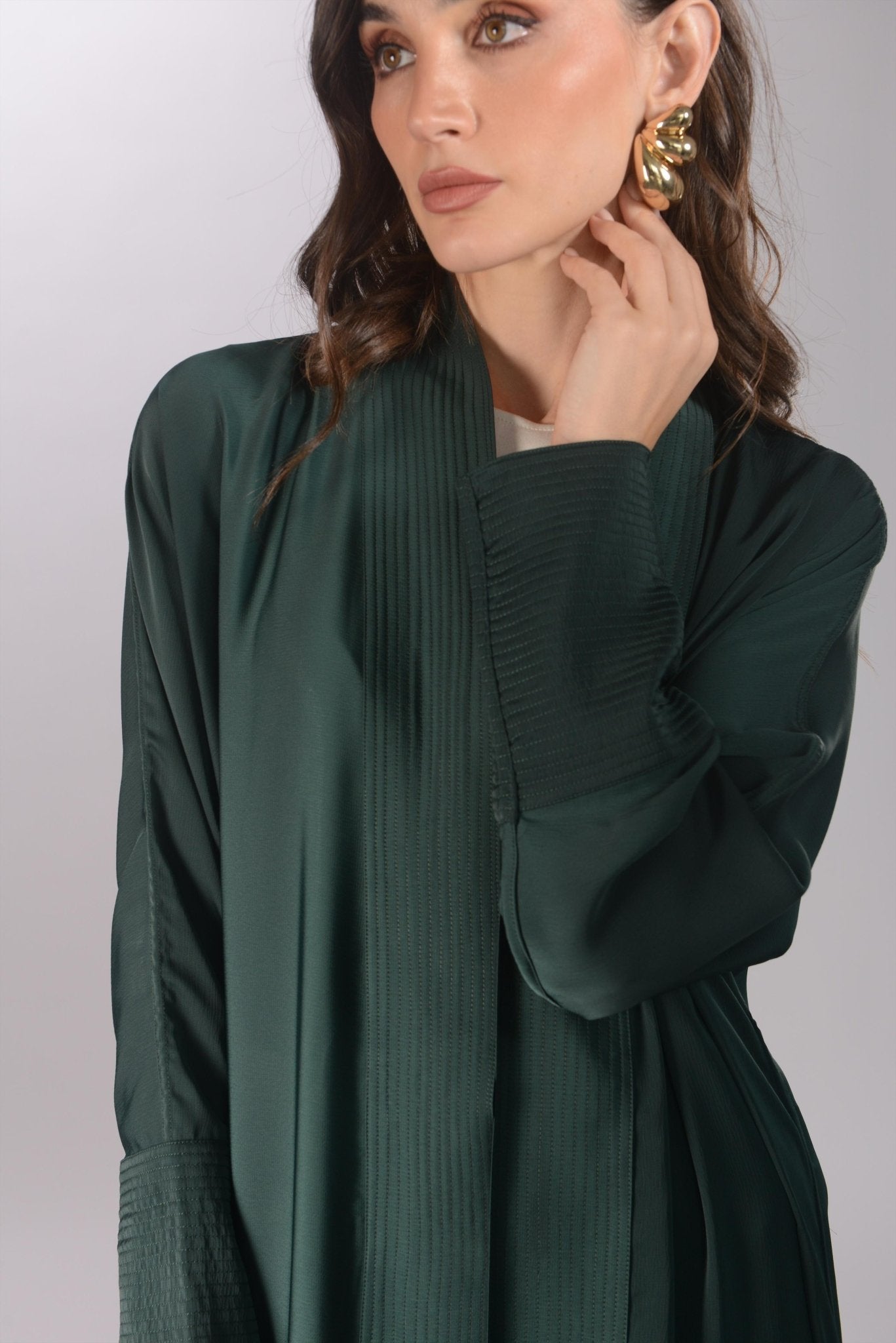 TH1745 ABAYA - THAA KSA - MIRA Y MANO