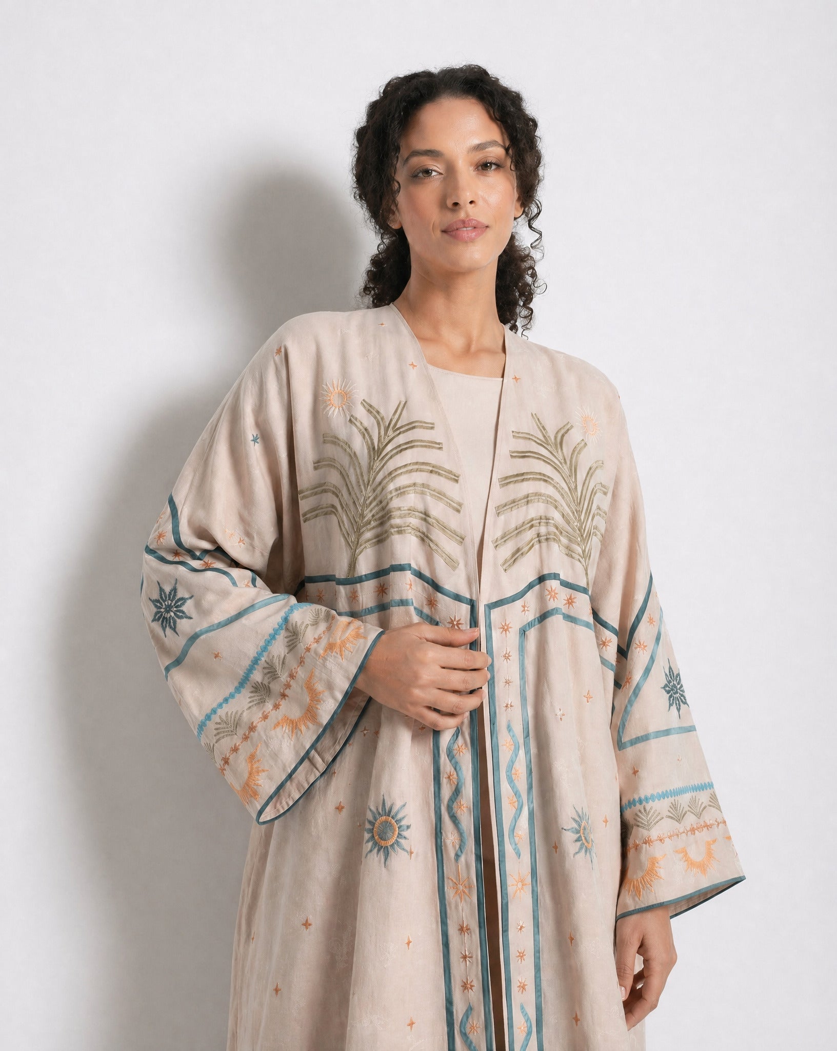 SHES BEEN THROUGH SUNS ABAYA - THE UNTITLED PROJECT - MIRA Y MANO